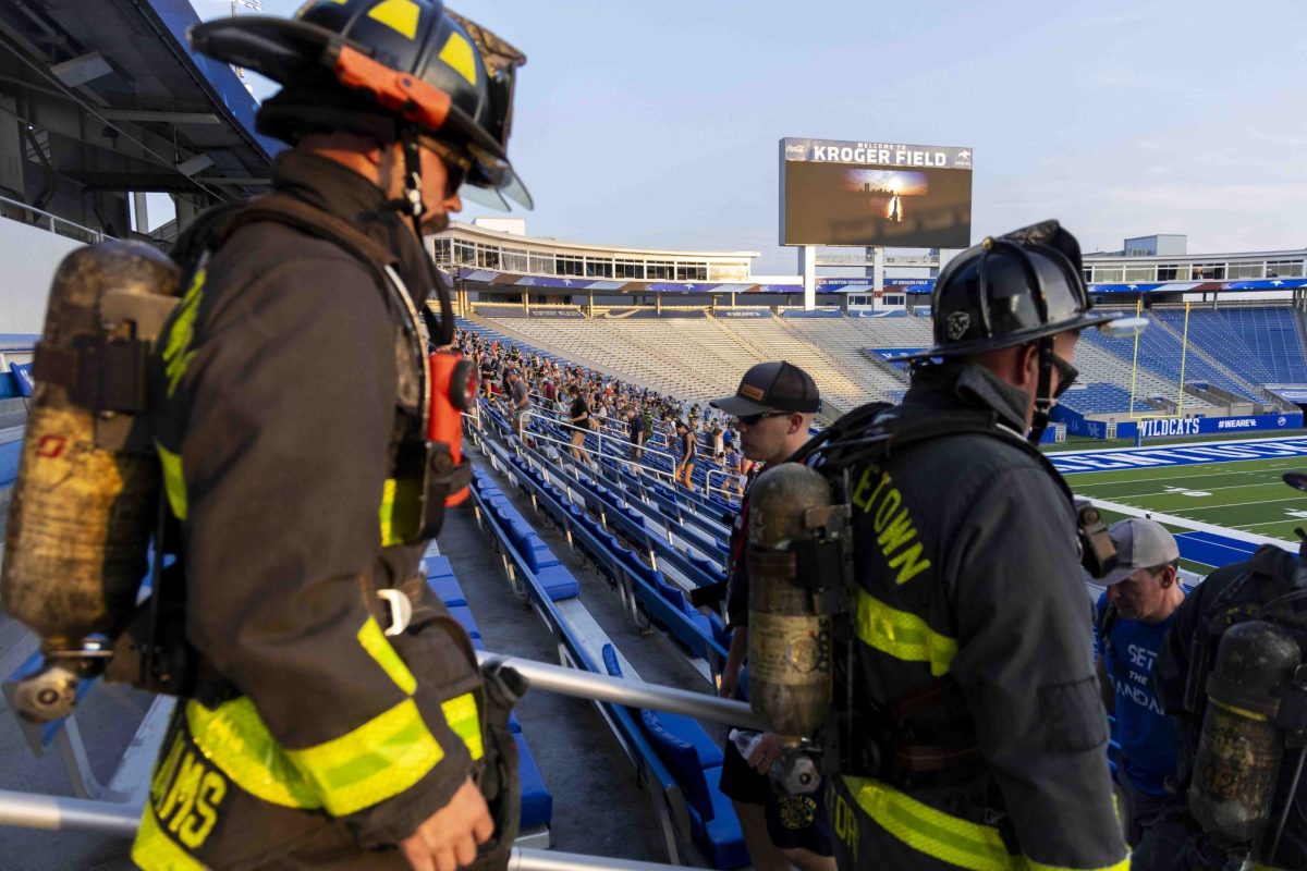 Community members and firefighters participate in the 9/11 Memorial Stair Climb on Wednesday, Sept. 11, 2024, at Kroger Field in Lexington, Kentucky. Photo by Matthew Mueller | Staff