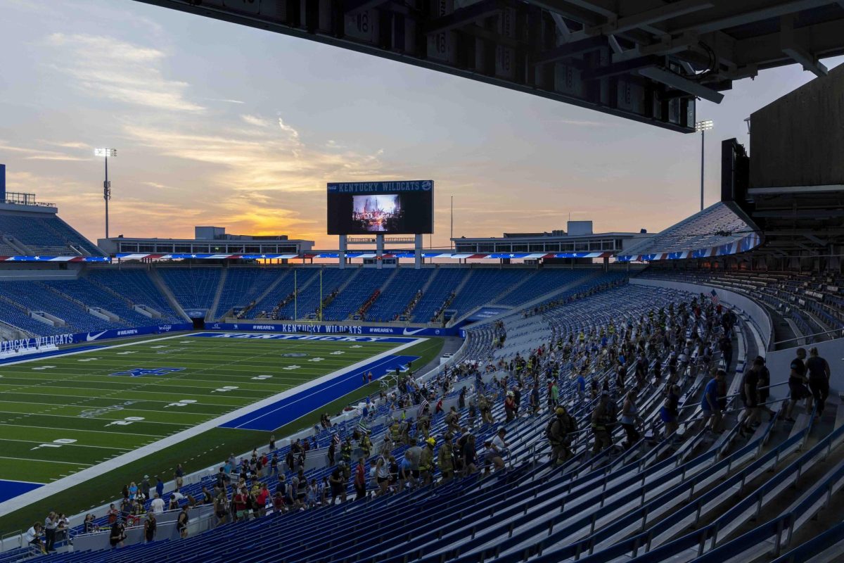 Community members and firefighters participate in the 9/11 Memorial Stair Climb on Wednesday, Sept. 11, 2024, at Kroger Field in Lexington, Kentucky. Photo by Matthew Mueller | Staff