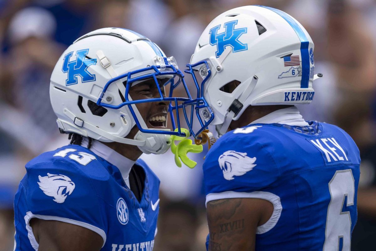 Kentucky Wildcats wide receiver Dane Key (6) celebrates with Kentucky Wildcats wide receiver Fred Farrier II (13) after a play during the game vs. Ohio University on Saturday, Sept. 21, 2024, at Kroger Field in Lexington, Kentucky. Kentucky won 41-6. Photo by Matthew Mueller | Staff