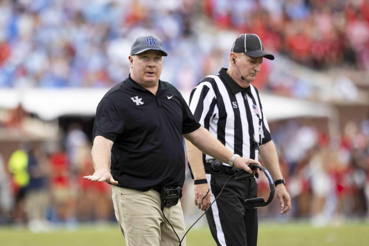 Kentucky Wildcats head coach Mark Stoops signals for an incomplete pass after a play during the game between the Old Miss Rebels and the Kentucky Wildcats on Saturday, Sept. 28, 2024, at Vaught-Hemingway Stadium in Oxford, Mississippi. Kentucky won 20-17. Photo by Matthew Mueller | Staff 