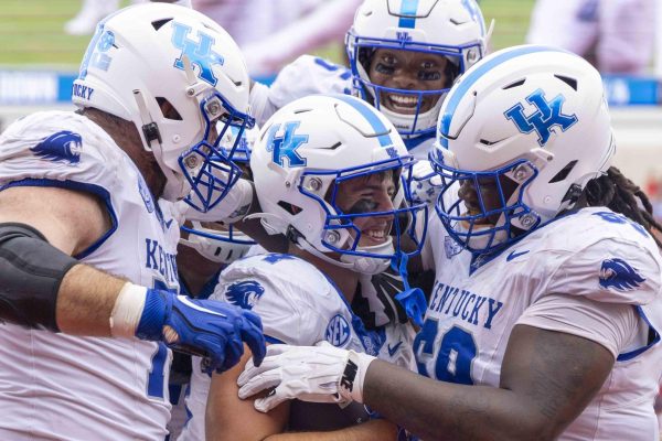 Kentucky offensive line player celebrate after Kentucky Wildcats tight end Josh Kattus (84) recovered the ball for a touchdown during the football game between the Old Miss Rebels and the Kentucky Wildcats on Saturday, Sept. 28, 2024, at Vaught-Hemingway Stadium in Oxford, Mississippi. Kentucky won 20-17. Photo by Matthew Mueller | Staff 