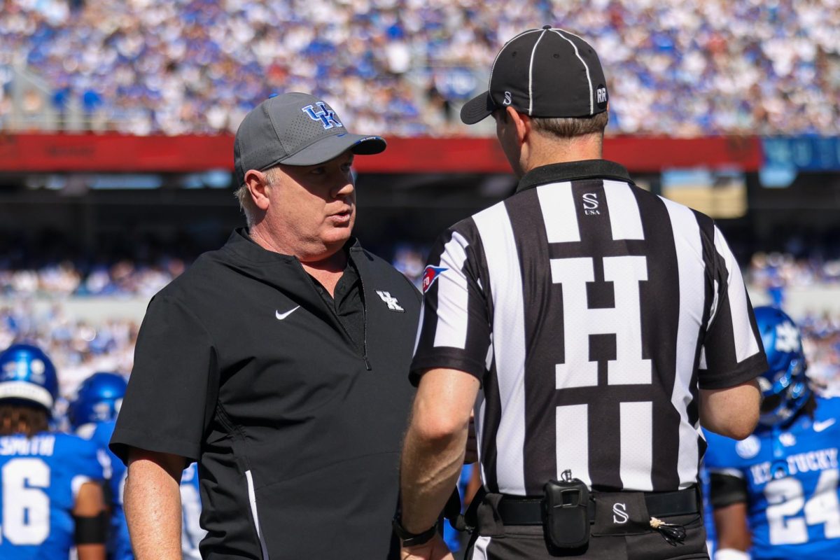 Kentucky head coach Mark Stoops talks to a ref during the Kentucky vs Southern Carolina football game on Saturday, Sept. 7, 2024, at Kroger Field in Lexington Kentucky. Kentucky lost 31-6. Photo by Sydney Yonker | Staff