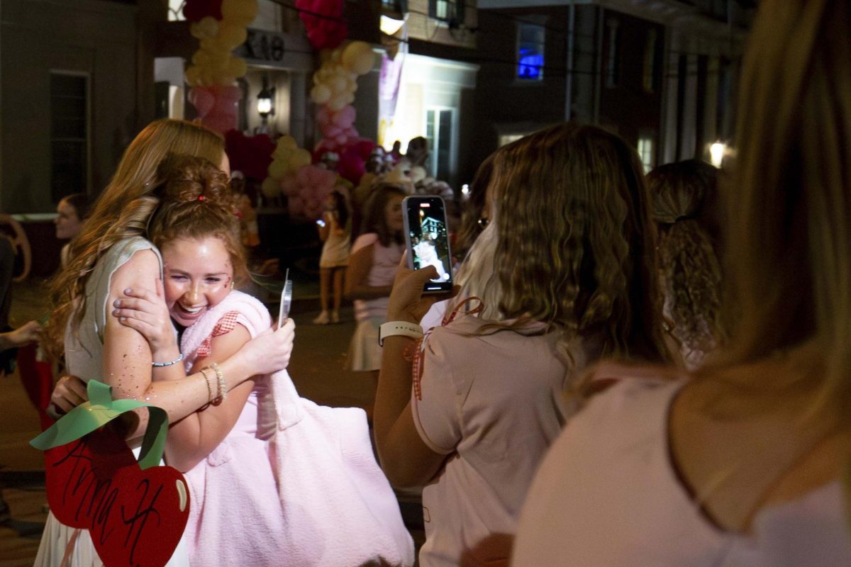 Alpha Chi Omega member embraces a new member during Sorority Bid Day on Monday, Sep 10, 2024. Photo by Sydney Novack | staff