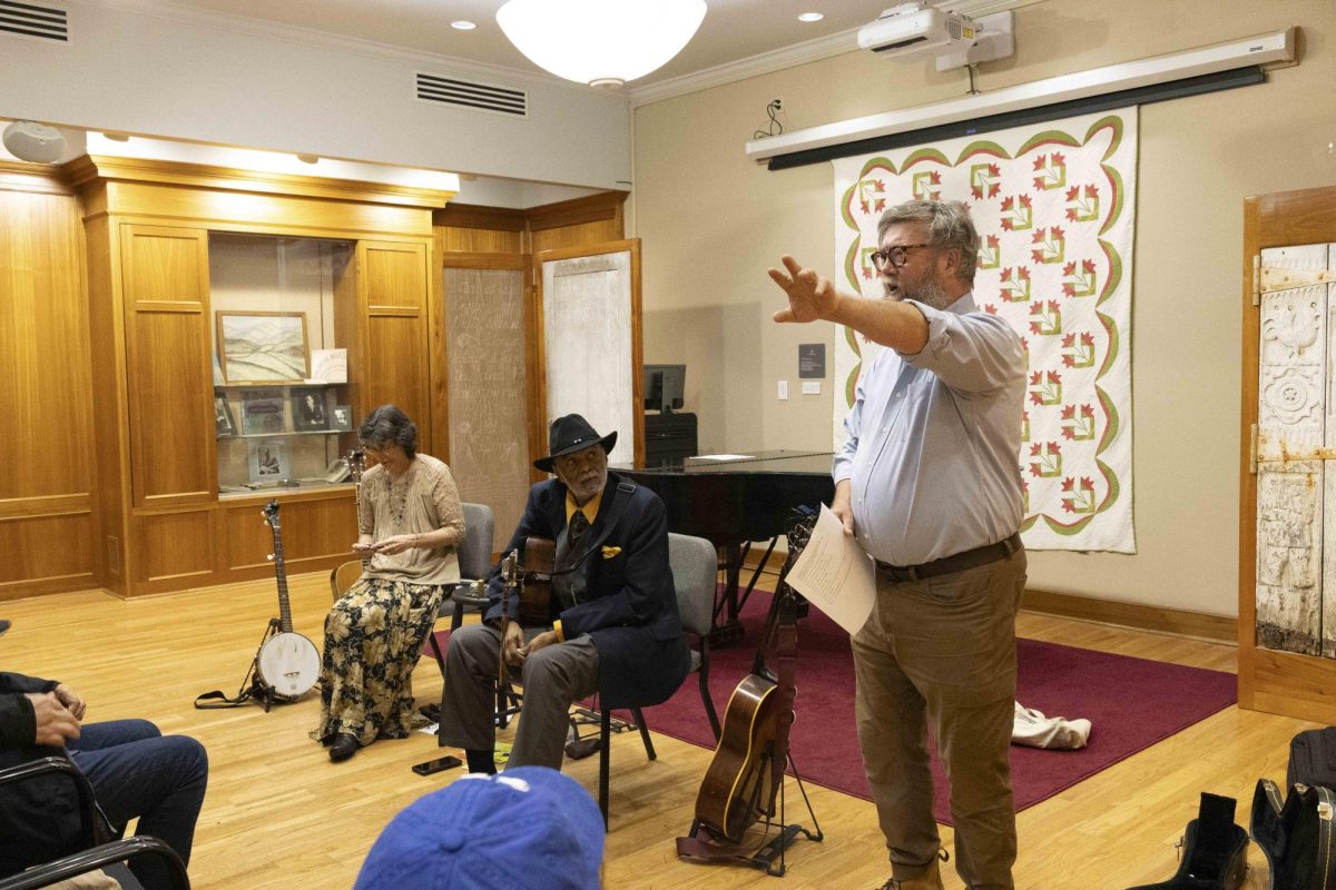 James Revell Carr introduces Sparky and Rhonda Rucker before their performance at Appalachia in the Bluegrass performance on Friday, Sept. 13, 2024, at John Jacobs Niles Center for American Music in Lexington, Kentucky. Photo by Josie Zoeller | Staff