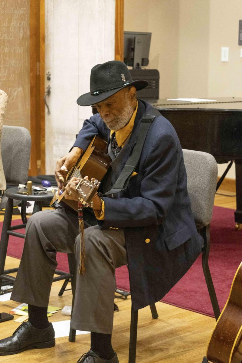 Sparky Rucker plays his guitar during the Appalachia in the Bluegrass performance on Friday, Sept. 13, 2024, at John Jacobs Niles Center for American Music in Lexington, Kentucky. Photo by Josie Zoeller | Staff