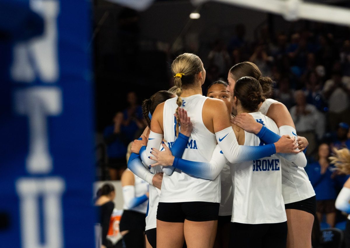 The Kentucky team huddles during the No. 9 Kentucky vs. No. 7 Penn State women's volleyball match on Friday, Sept. 6, 2024, at Memorial Coliseum in Lexington, Kentucky. Kentucky lost 2-3. Photo by Brayden Finn | Staff