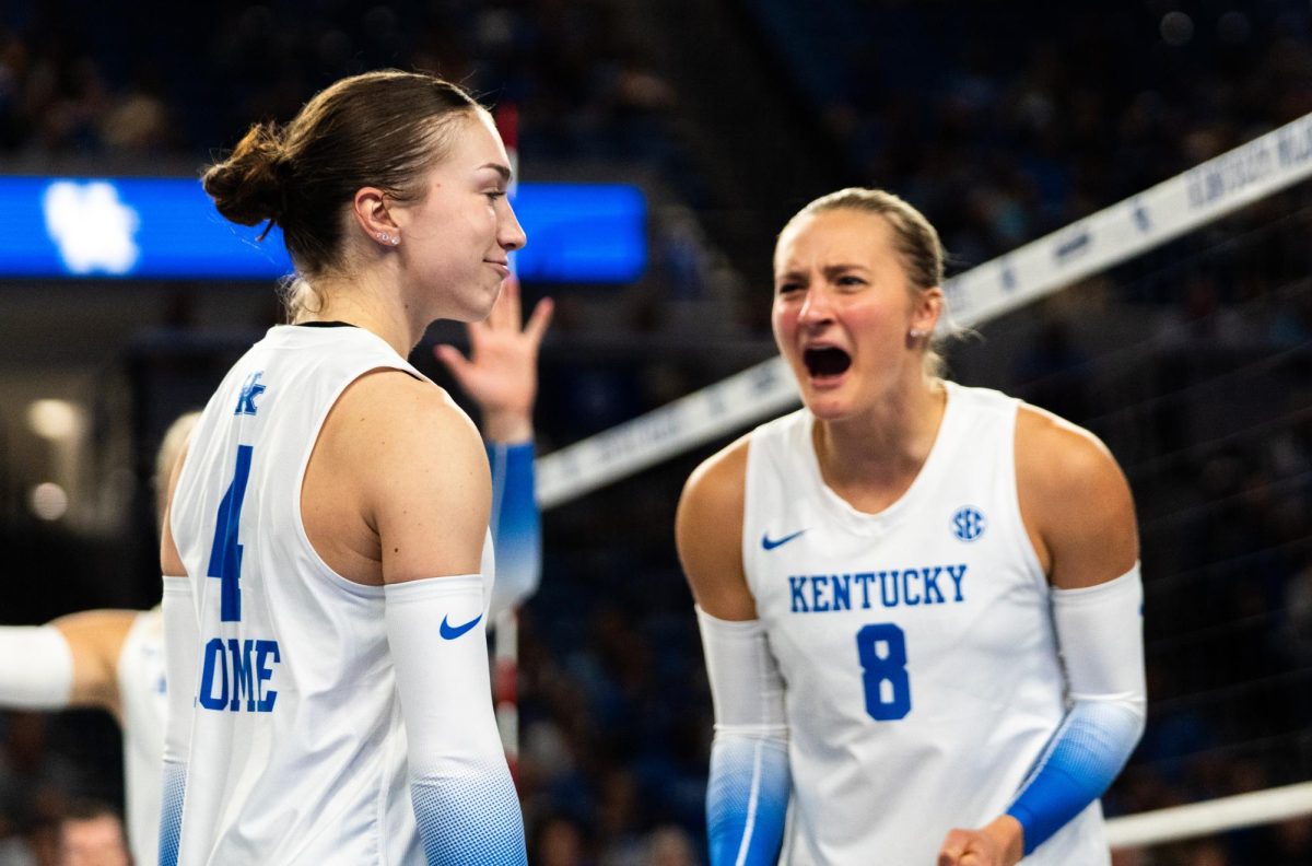 Kentucky setter Emma Grove (4) reacts to scoring a point during the No. 9 Kentucky vs. No. 7 Penn State women's volleyball match on Friday, Sept. 6, 2024, at Memorial Coliseum in Lexington, Kentucky. Kentucky lost 2-3. Photo by Brayden Finn | Staff