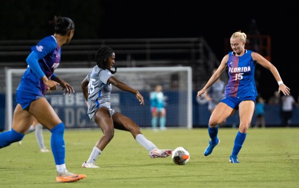 Kentucky women's soccer forward Makala Woods goes for ball against a Florida defender in Kentucky women’s soccer game vs. Florida on Thursday, Sept. 19, 2024, at the Wendell & Vickie Bell Soccer Complex in Lexington, Kentucky. The teams drew 0-0. Photo by Brayden Finn | Staff