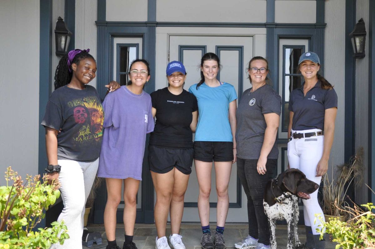 Students pose for a photo on Saturday, Aug. 31, 2024, at the Secretariat Center in Lexington, Kentucky. Photo by Isabella Sepahban | Staff