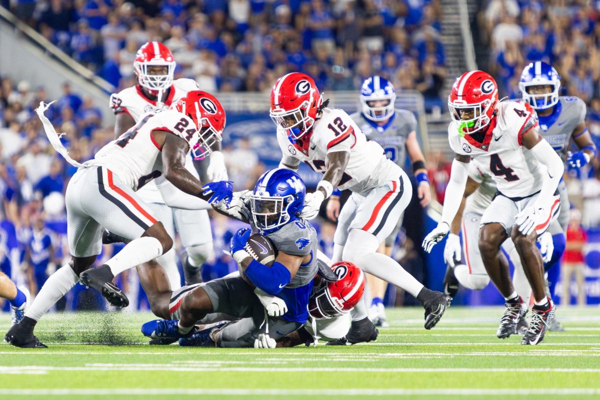 Kentucky running back Demie Sumo-Karngbaye (0) is tackled after a run during the Kentucky vs. No. 1 Georgia football game on Saturday, Sept. 14, 2024, at Kroger Field in Lexington, Kentucky. Kentucky lost 13-12. Photo by Samuel Colmar | Staff