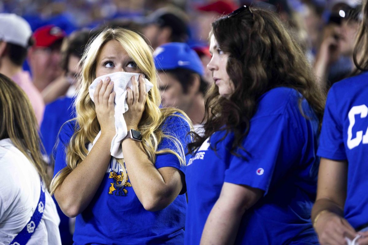 A Kentucky fan waits as officials decide the remaining clock time during the Kentucky vs. No. 1 Georgia football game on Saturday, Sept. 14, 2024, at Kroger Field in Lexington, Kentucky. Kentucky lost 13-12. Photo by Samuel Colmar | Staff