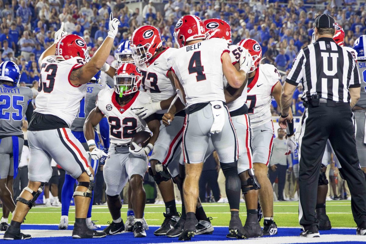 Georgia running back Branson Robinson (22) celebrates after scoring a touchdown during the Kentucky vs. No. 1 Georgia football game on Saturday, Sept. 14, 2024, at Kroger Field in Lexington, Kentucky. Kentucky lost 13-12. Photo by Samuel Colmar | Staff