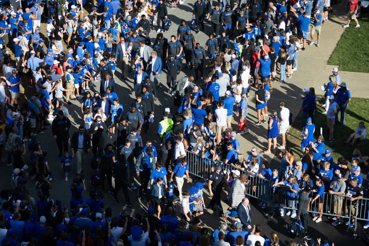 The Kentucky team arrives at the 'Catwalk' before the Kentucky vs. No. 1 Georgia football game on Saturday, Sept. 14, 2024, at Kroger field in Lexington, Kentucky. Photo by Samuel Colmar | Staff