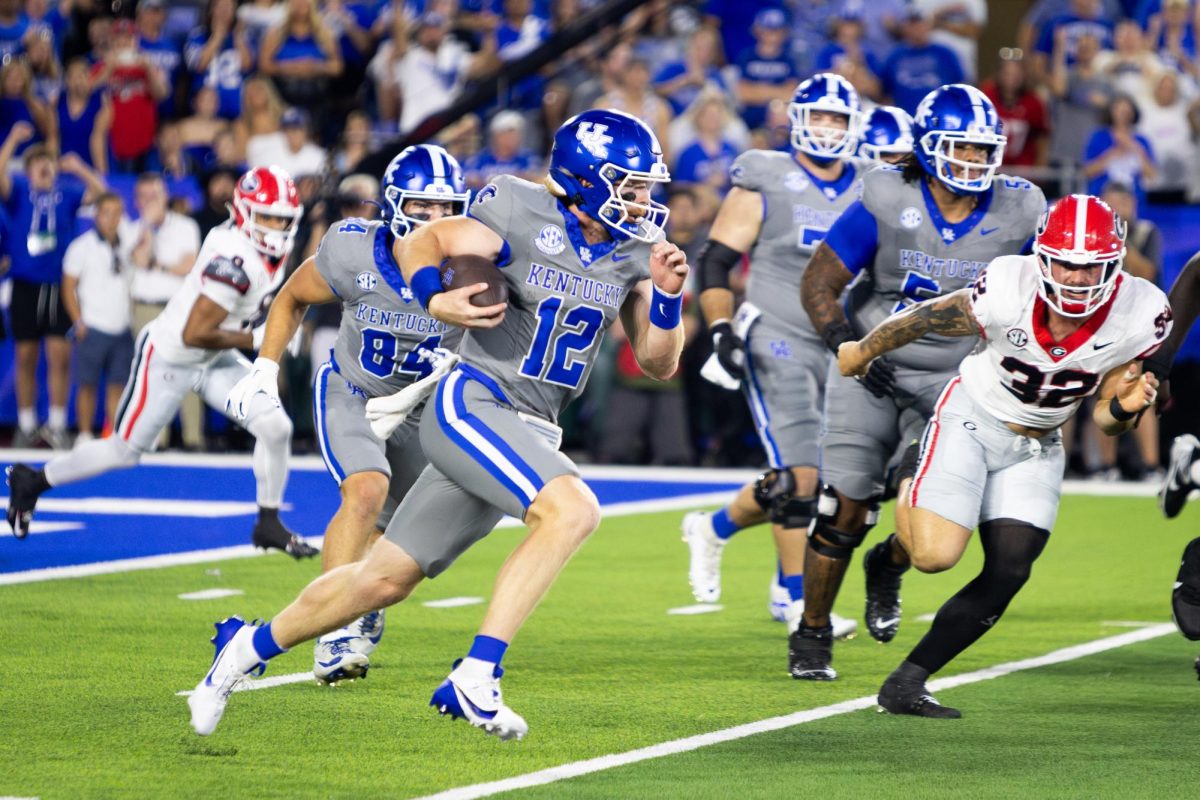 Kentucky quarterback Brock Vandagriff (12) runs with the ball during the Kentucky vs. No. 1 Georgia football game on Saturday, Sept. 14, 2024, at Kroger Field in Lexington, Kentucky. Photo by Samuel Colmar | Staff