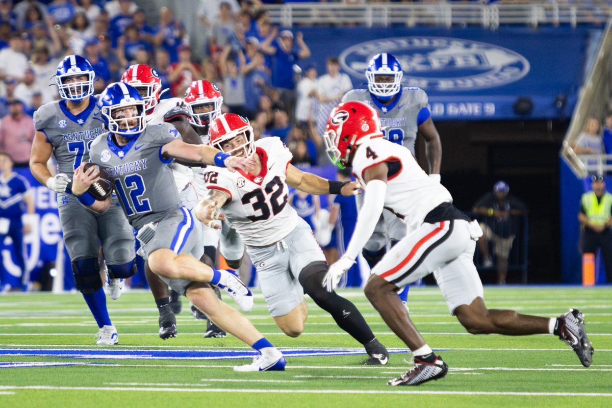 Kentucky quarterback Brock Vandagriff (12) runs with the ball during the Kentucky vs. No. 1 Georgia football game on Saturday, Sept. 14, 2024, at Kroger Field in Lexington, Kentucky. Photo by Samuel Colmar | Staff