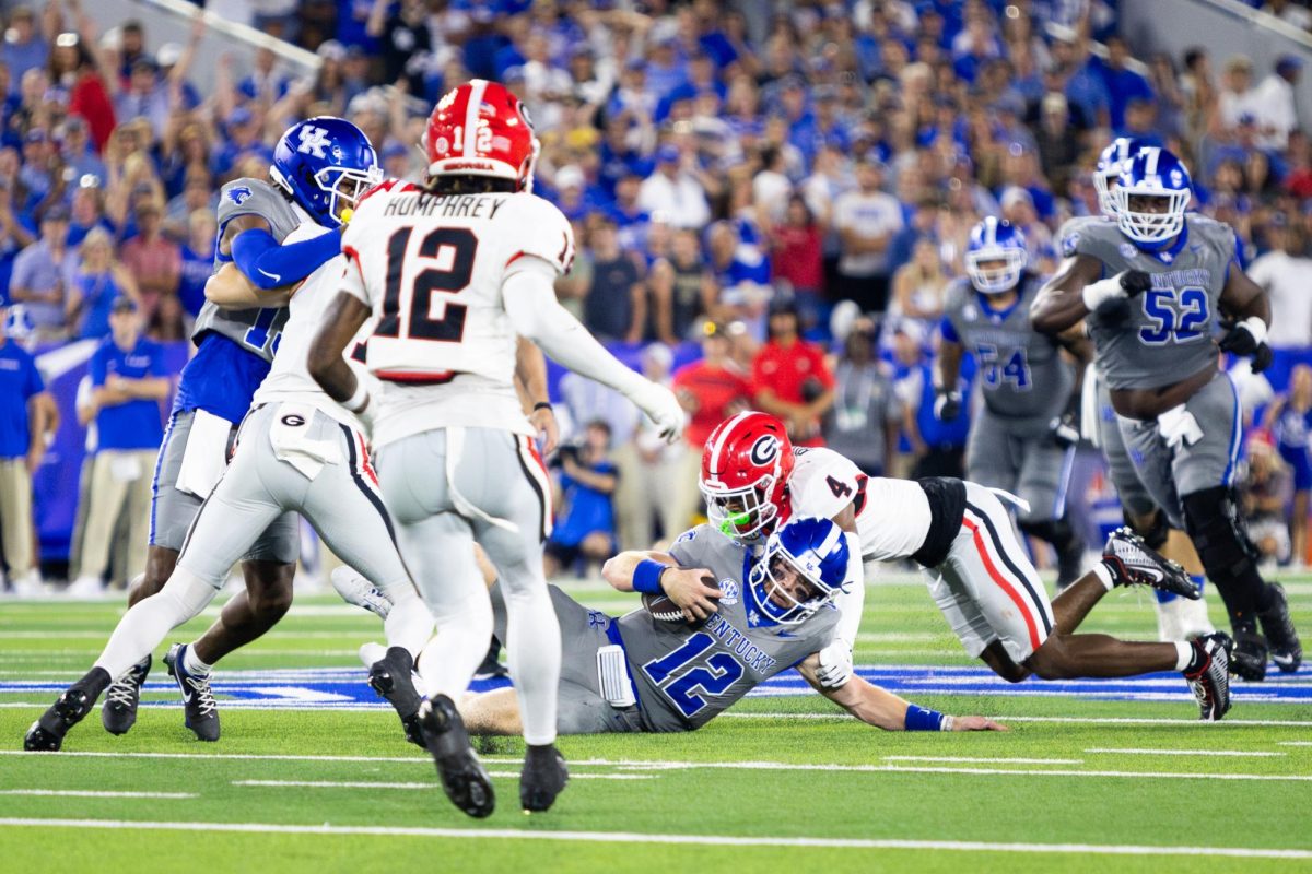 Kentucky quarterback Brock Vandagriff (12) slides with the ball during the Kentucky vs. No. 1 Georgia football game on Saturday, Sept. 14, 2024, at Kroger Field in Lexington, Kentucky. Photo by Samuel Colmar | Staff