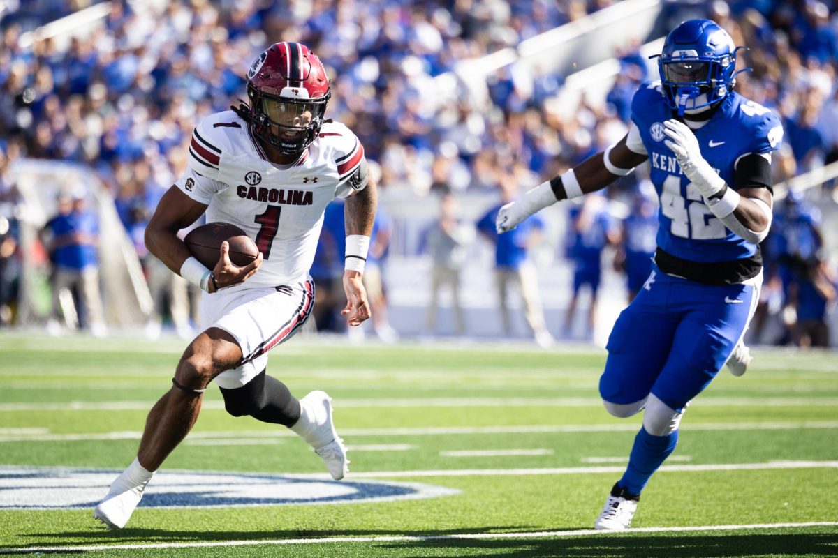 South Carolina quarterback Robby Ashford (1) runs with the ball during the Kentucky vs. South Carolina football game on Saturday, Sept. 7, 2024, at Kroger Field in Lexington, Kentucky. Kentucky lost 31-6. Photo by Samuel Colmar | Staff