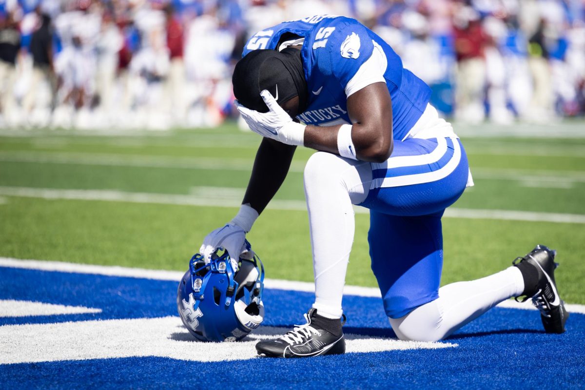 Kentucky tight end Khamari Anderson (15) puts his head on his hand before the Kentucky vs. South Carolina football game on Saturday, Sept. 7, 2024, at Kroger Field in Lexington, Kentucky. Kentucky lost 31-6. Photo by Samuel Colmar | Staff