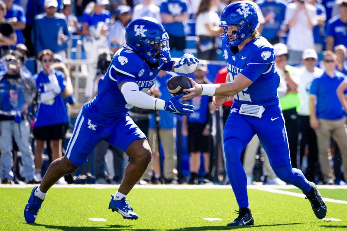 Kentucky quarterback Brock Vandagriff (12) hands the ball off during the Kentucky vs. South Carolina football game on Saturday, Sept. 7, 2024, at Kroger Field in Lexington, Kentucky. Kentucky lost 31-6. Photo by Samuel Colmar | Staff