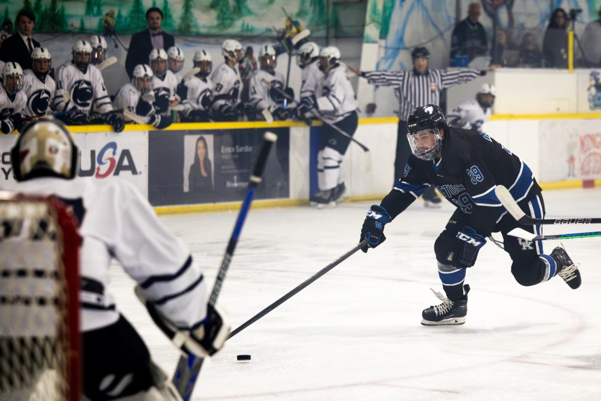 Kentucky forward Caden Martin (39) chases after the puck during the Kentucky vs. Penn State hockey match on Saturday, Sept. 14, 2024, at the Lexington Ice and Recreation Center in Lexington, Kentucky. Kentucky won 4-1. Photo by Samuel Colmar | Staff