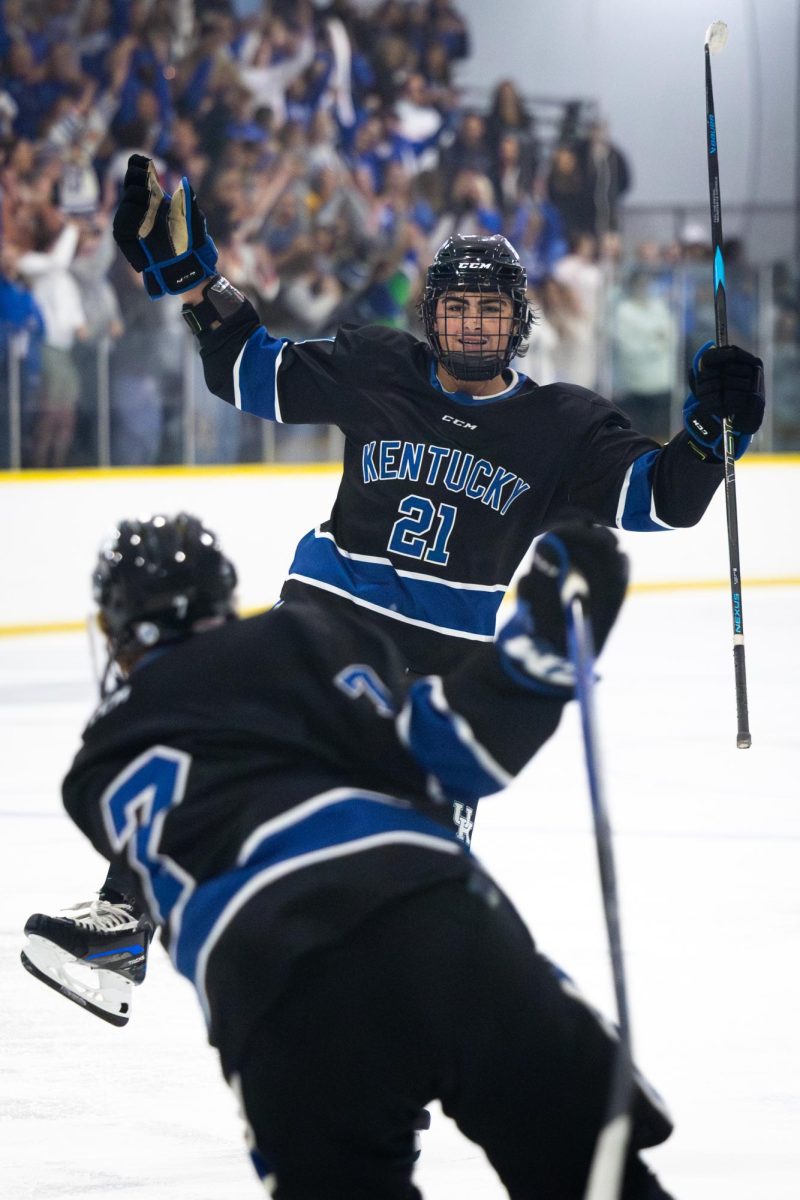 Kentucky winger Nick Delaney (21) celebrates after a goal is scored during the Kentucky vs. Penn State hockey match on Saturday, Sept. 14, 2024, at the Lexington Ice and Recreation Center in Lexington, Kentucky. Kentucky won 4-1. Photo by Samuel Colmar | Staff