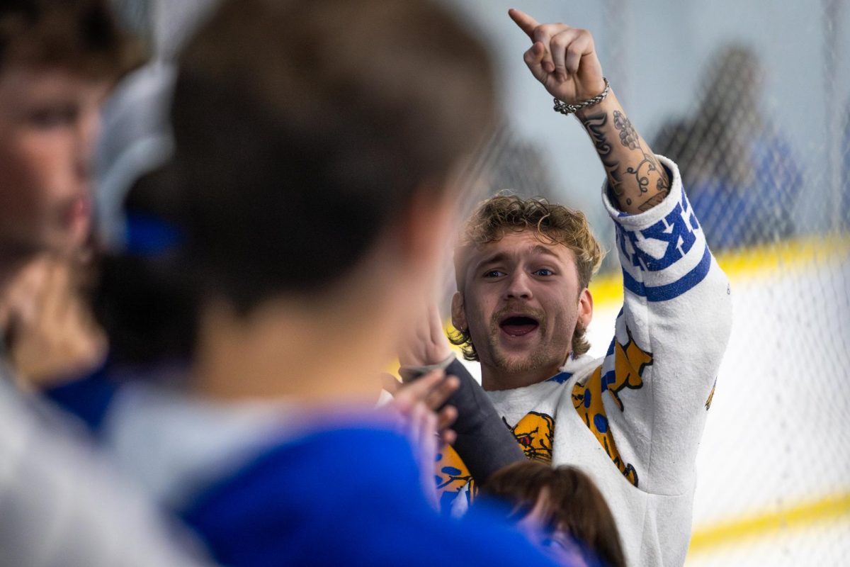 A fan celebrates after Kentucky scores a goal during the Kentucky vs. Penn State hockey match on Saturday, Sept. 14, 2024, at the Lexington Ice and Recreation Center in Lexington, Kentucky. Kentucky won 4-1. Photo by Samuel Colmar | Staff