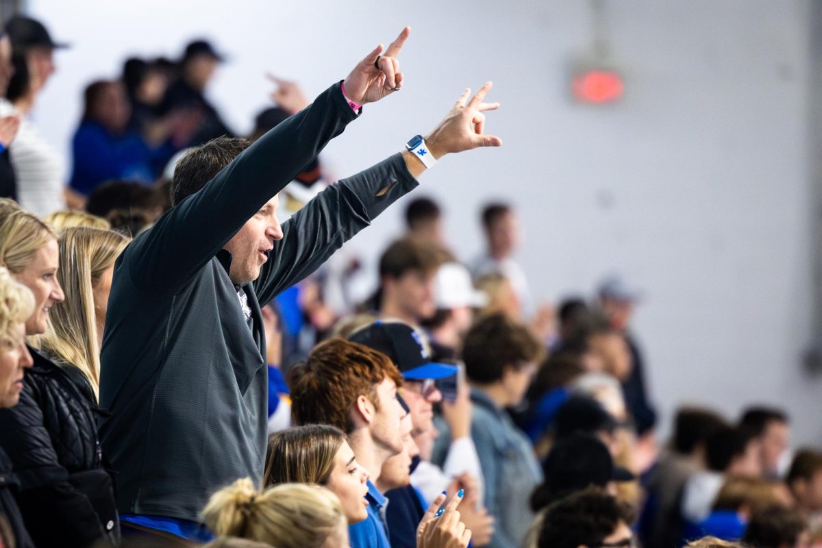 A fan celebrates after Kentucky scores a goal during the Kentucky vs. Penn State hockey match on Saturday, Sept. 14, 2024, at the Lexington Ice and Recreation Center in Lexington, Kentucky. Kentucky won 4-1. Photo by Samuel Colmar | Staff