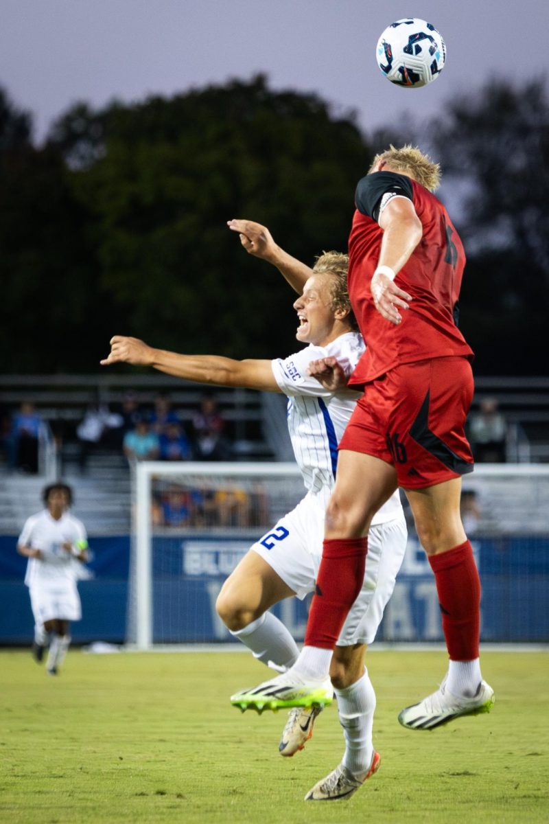 Kentucky forward Logan Dorsey (12) goes for a header during the No. 16 Kentucky vs. 15. Louisville men’s soccer match on Monday, Sept. 9, 2024, at the Wendell and Vickie Bell Soccer Complex in Lexington, Kentucky. Kentucky lost 1-0. Photo by Samuel Colmar | Staff