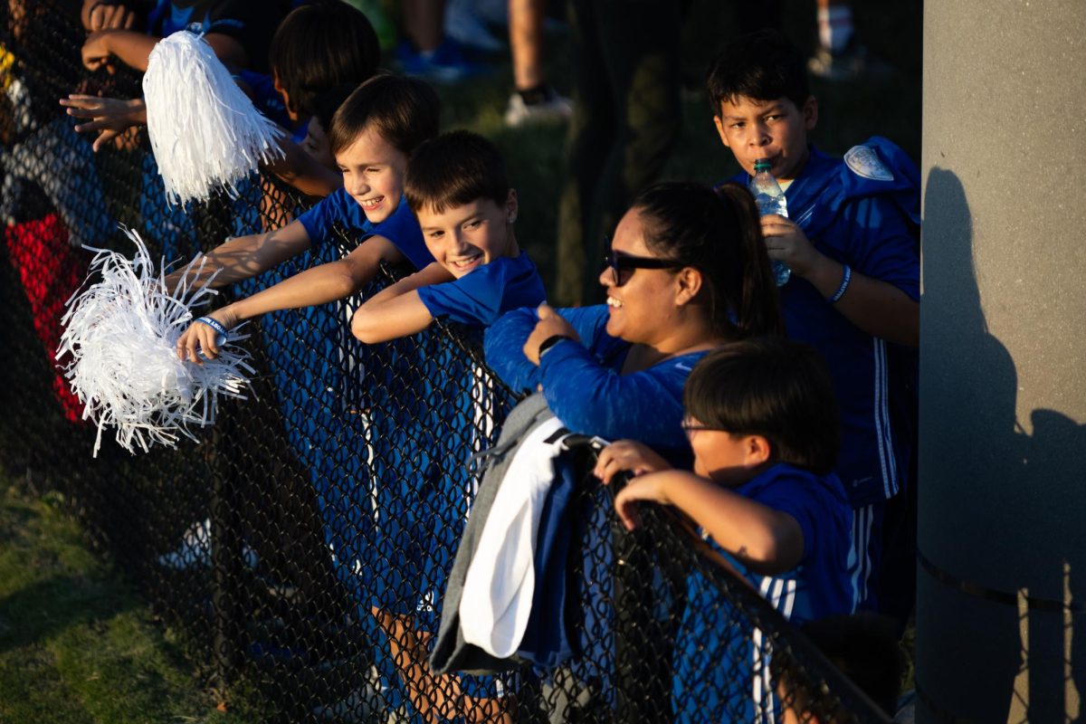 Fans watch Kentucky players warm up before the No. 16 Kentucky vs. 15. Louisville men’s soccer match on Monday, Sept. 9, 2024, at the Wendell and Vickie Bell Soccer Complex in Lexington, Kentucky. Kentucky lost 1-0. Photo by Samuel Colmar | Staff