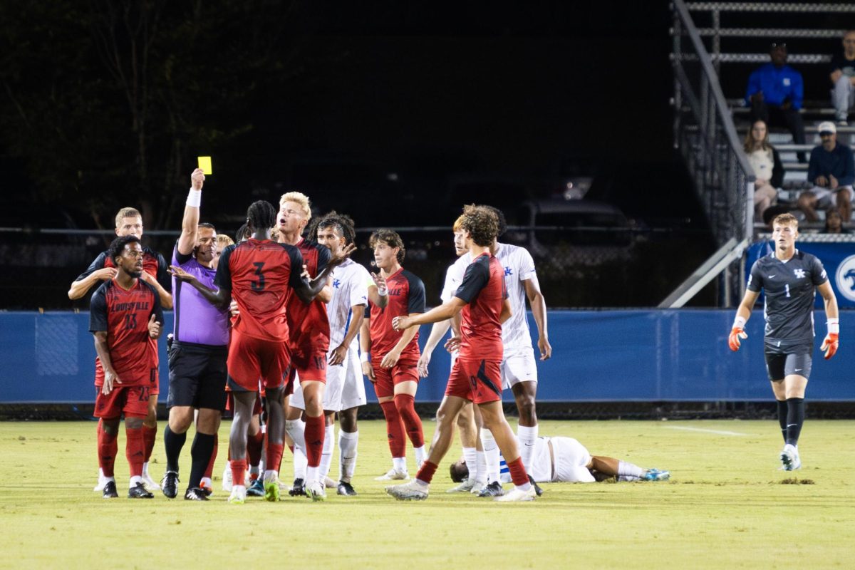 Louisville defender Olayinka Ogunleye (3) receives a yellow card during the No. 16 Kentucky vs. 15. Louisville men’s soccer match on Monday, Sept. 9, 2024, at the Wendell and Vickie Bell Soccer Complex in Lexington, Kentucky. Kentucky lost 1-0. Photo by Samuel Colmar | Staff