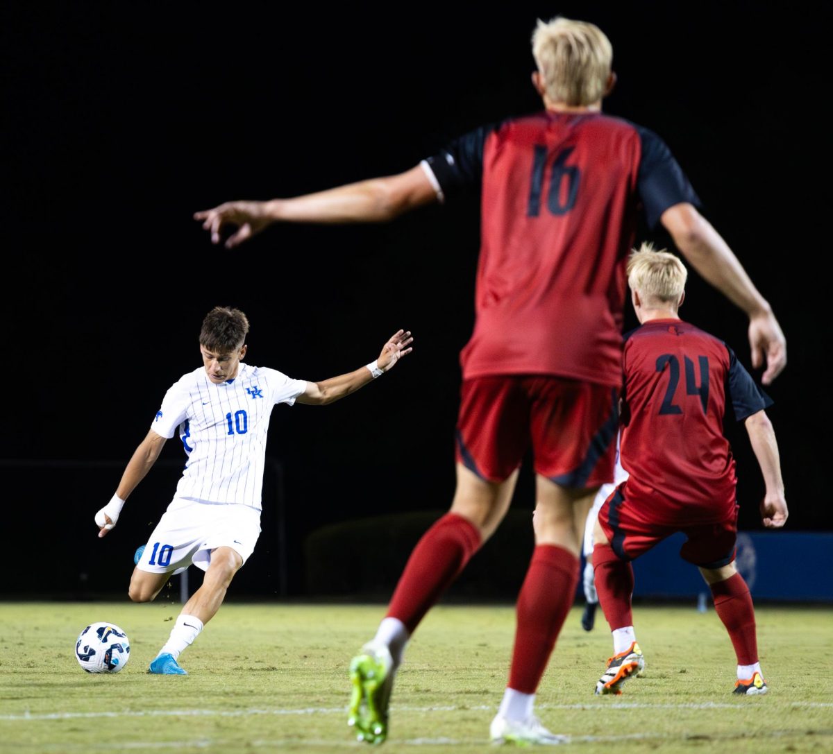 Kentucky midfielder Agustin Lopez (12) prepares to kick the ball during the No. 16 Kentucky vs. 15. Louisville men’s soccer match on Monday, Sept. 9, 2024, at the Wendell and Vickie Bell Soccer Complex in Lexington, Kentucky. Kentucky lost 1-0. Photo by Samuel Colmar | Staff