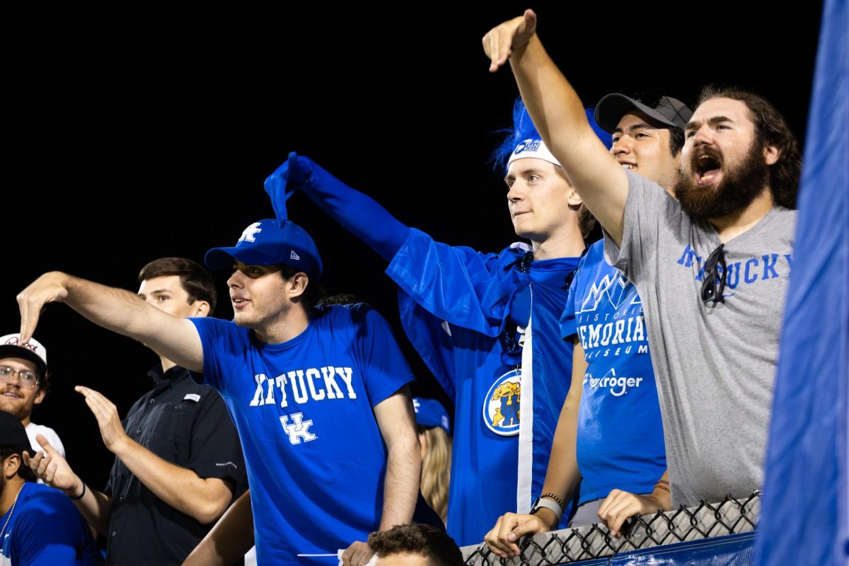 Kentucky fans gesture towards Louisville players during the No. 16 Kentucky vs. 15. Louisville men’s soccer match on Monday, Sept. 9, 2024, at the Wendell and Vickie Bell Soccer Complex in Lexington, Kentucky. Kentucky lost 1-0. Photo by Samuel Colmar | Staff