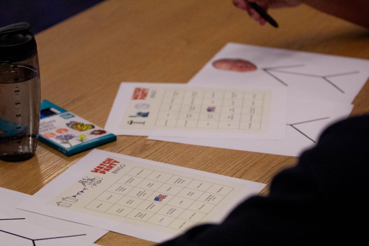 Students complete bingo cards at the vice presidential debate watch party hosted by Turning Point USA’s UK Chapter on Tuesday, Oct. 1, 2024, at the Gatton Student Center in Lexington, Kentucky. Photo by Christian Kantosky | Staff