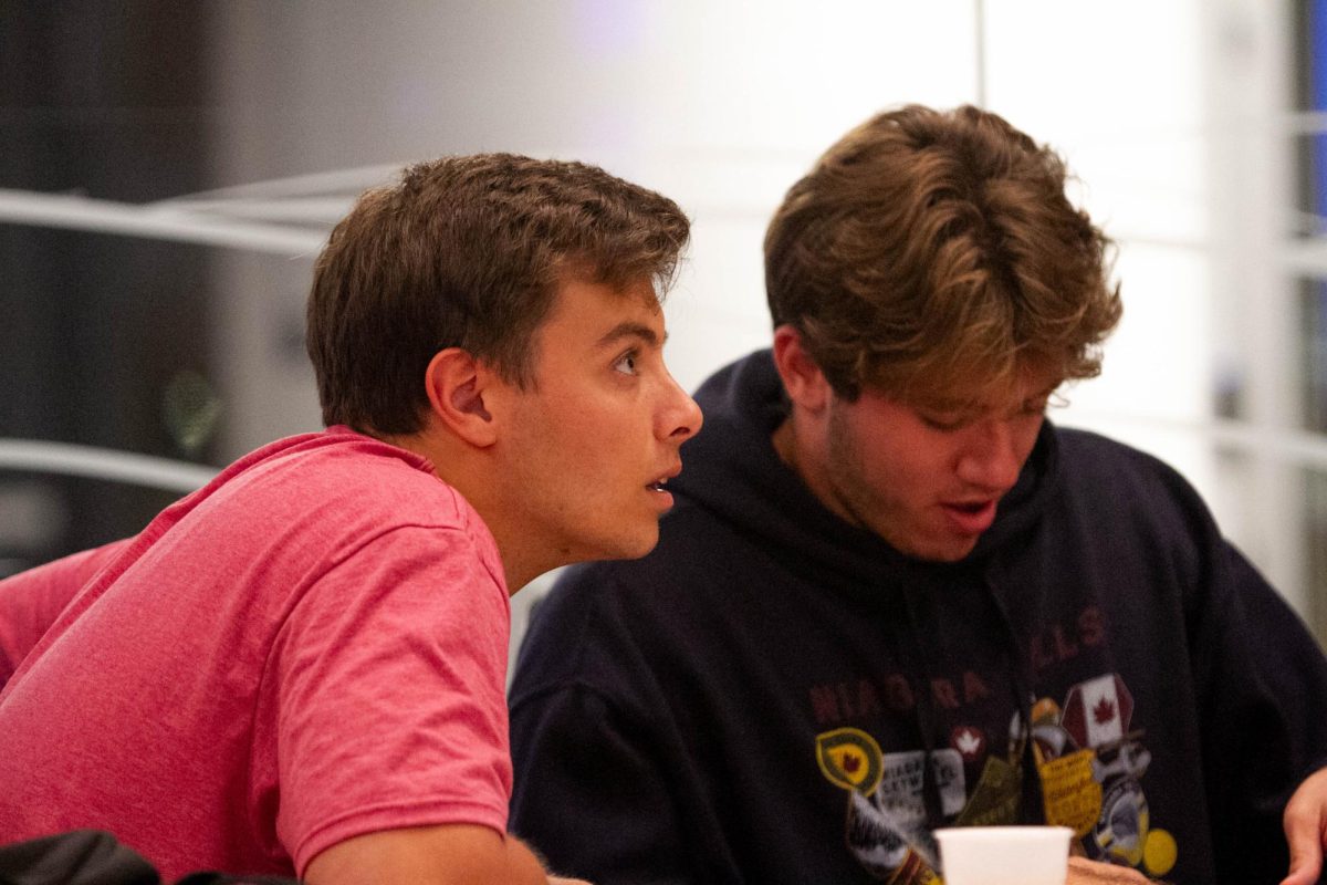 Blake Eggleston, a freshman political science student, reacts to one of Gov. Tim Walz’s points during the vice presidential debate Turning Point watch party on Tuesday, Oct. 1, 2024, at the Gatton Student Center in Lexington, Kentucky. Photo by Christian Kantosky | Staff