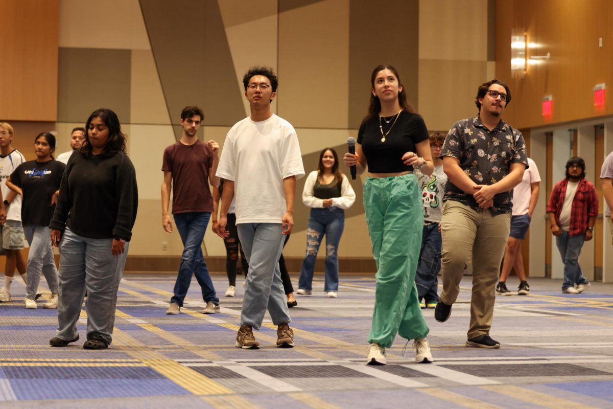 Kentucky students dance the Bachata during the Hay Que Bailar event in the Gatton Student Center Ballroom in Lexington, Kentucky, on Tuesday, Oct. 1, 2024. Photo by Sydney Yonker | Staff