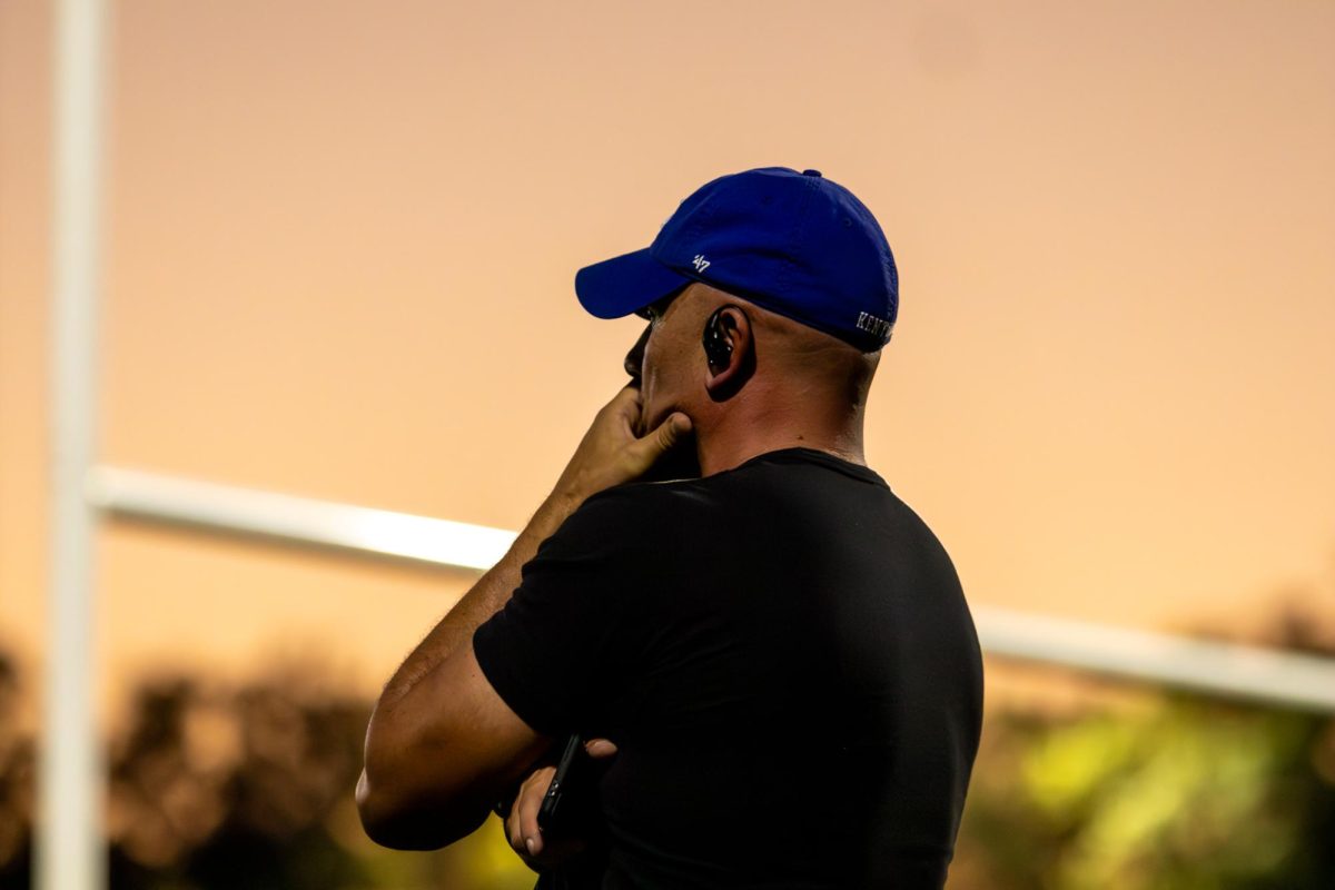 Fan watches intensely during the Kentucky vs Tennessee Men's Rugby Club game on Friday, Oct. 4, 2024, at the William H. Pieratt Fields in Lexington, Kentucky. Kentucky Won 42-25. Photo by Sydney Novack | Staff
