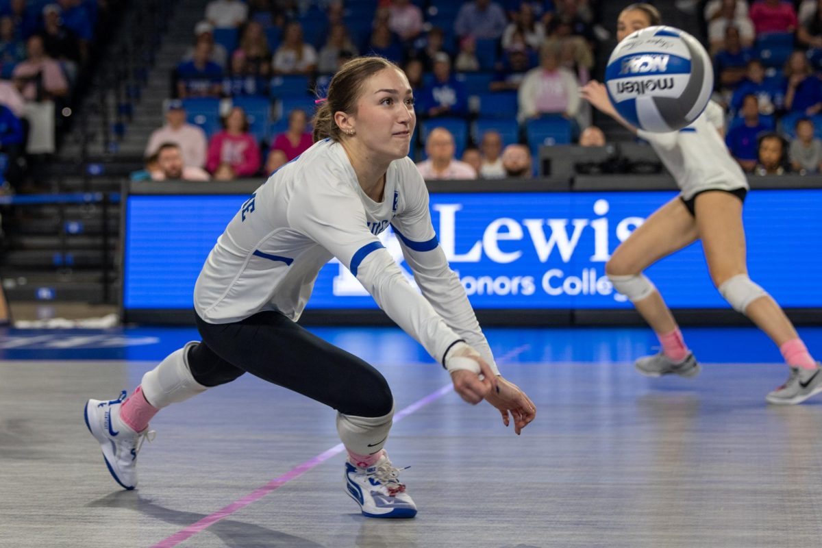 Kentucky setter Emma Grome (4) dives for a ball during the Kentucky vs Missouri Volleyball game on Sunday, Oct. 6, 2024, at Memorial Coliseum in Lexington, Kentucky. Kentucky won 3-0. Photo by Sydney Yonker | Staff