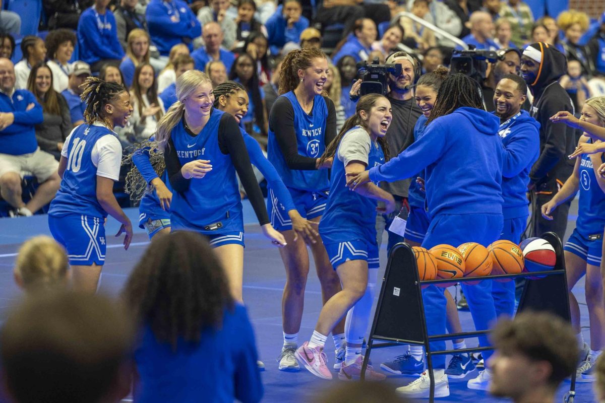 Kentucky Women’s Basketball celebrates after guard Georgia Amoore finishes the three-point challenge during Big Blue Madness on Friday, Oct. 11, 2024, at Rupp Arena in Lexington, Kentucky. Kentucky lost 20-13. Photo by Matthew Mueller | Staff