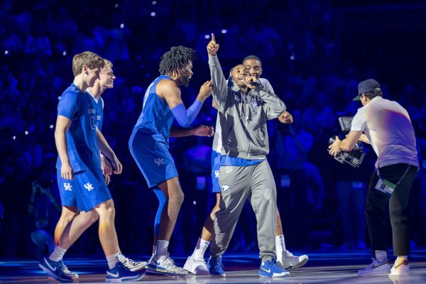 Kentucky guard Lamont Butler sings during his introduction during Big Blue Madness on Friday, Oct. 11, 2024, at Rupp Arena in Lexington, Kentucky.  Photo by Matthew Mueller | Staff