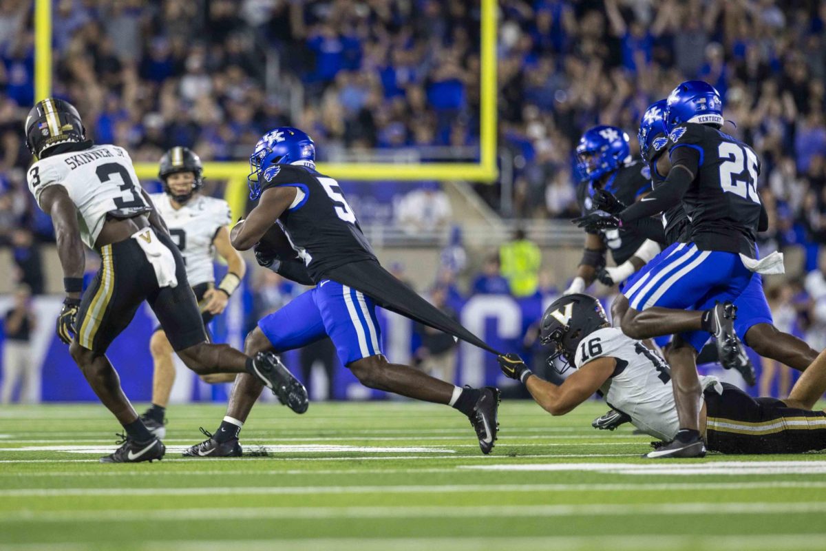 Kentucky Wildcats linebacker D'Eryk Jackson (54) intercepts the ball during the game vs. Vanderbilt on Saturday, Oct. 12, 2024, at Kroger Field in Lexington, Kentucky. Kentucky lost 20-13. Photo by Matthew Mueller | Staff