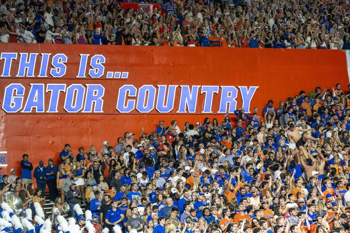 Florida Gators fans cheer after a touchdown is scored during the football game vs. Florida on Saturday, Oct. 19, 2024, at Ben Hill Griffin Stadium  in Gainesville, Florida. Kentucky lost 48-20. Photo by Matthew Mueller | Staff