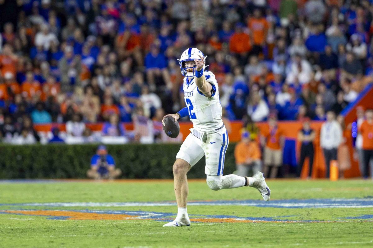 Kentucky Wildcats quarterback Brock Vandagriff (12) looks for an open receiver during the football game vs. Florida on Saturday, Oct. 19, 2024, at Ben Hill Griffin Stadium in Gainesville, Florida. Kentucky lost 48-20. Photo by Matthew Mueller | Staff