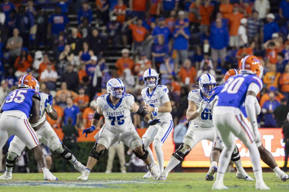 Kentucky Wildcats quarterback Cutter Boley (8) looks for an open receiver during the football game vs Florida on Saturday, Oct. 19, 2024, at Ben Hill Griffin Stadium in Gainesville, Florida. Kentucky lost 48-20. Photo by Matthew Mueller | Staff