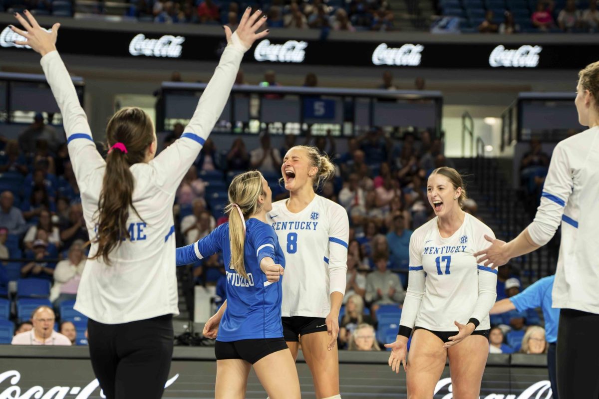 Kentucky volleyball celebrates after scoring a point during the match between Kentucky and Missouri on Sunday, Oct. 6, 2024, at Historic Memorial Coliseum in Lexington, Kentucky. Kentucky won 3-0. Photo by Will Luckett | Staff