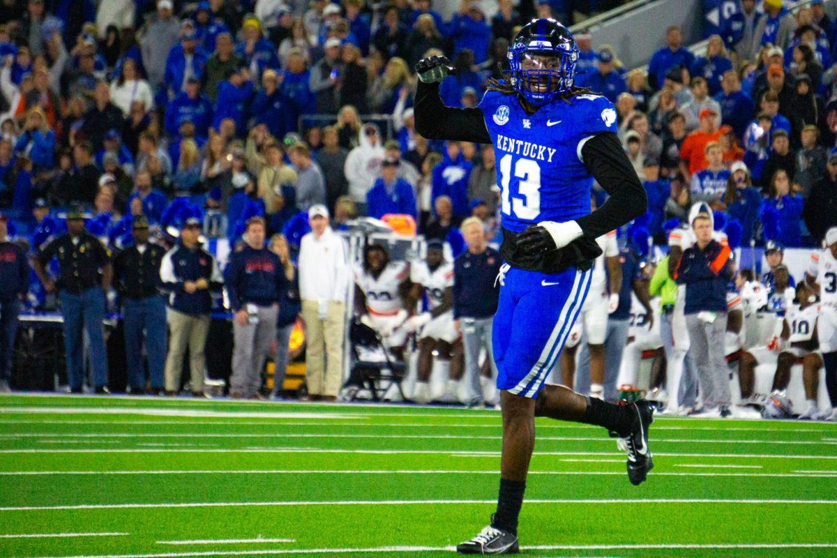 Kentucky outside linebacker J.J. Weaver (13) celebrates a stop during the football game vs. Auburn on Saturday, Oct. 26, 2024, at Kroger Field in Lexington, Kentucky. Photo by Isaiah Pinto | Staff