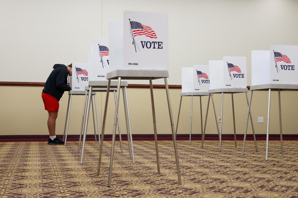 A voter fills out their ballot at a polling booth on Tuesday, May 16, 2023, at Elkhorn Crossing School in Georgetown, Kentucky. Photo by Abbey Cutrer | Kentucky Lantern