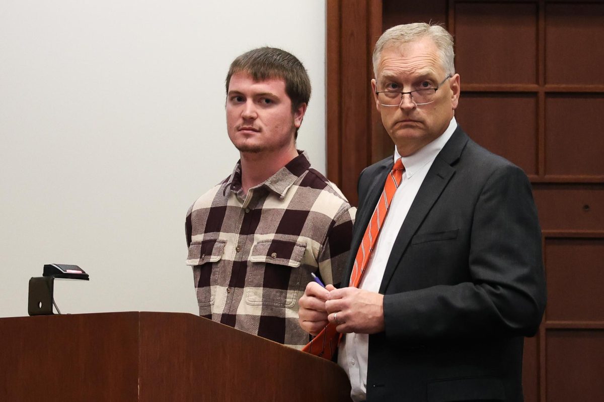 Chase McGuire stands at the podium at his preliminary hearing on Thursday, Oct. 10, 2024, at the Robert F. Stephens District Courthouse in Lexington, Kentucky. McGuire is facing charges of rape, strangulation, sodomy and sexual abuse of a UK student. Photo by Abbey Cutrer | Staff