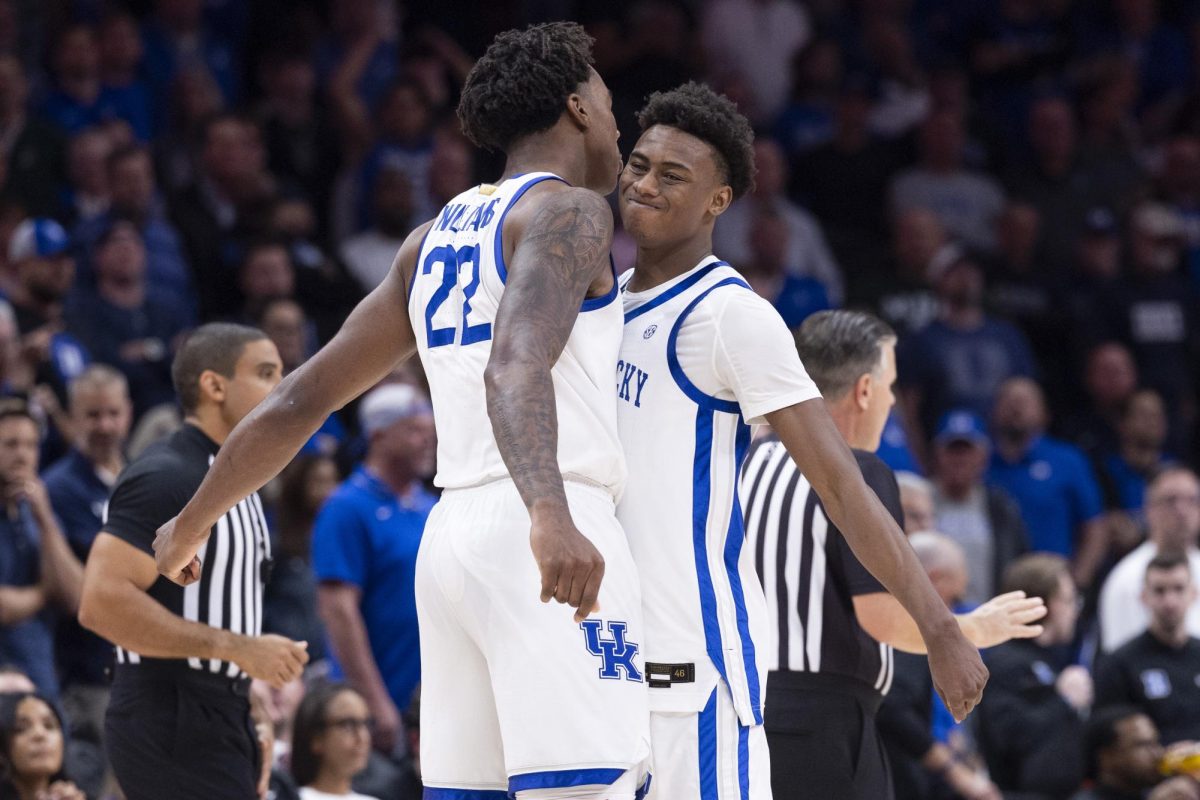 Kentucky Wildcats guard Jaxson Robinson (2) celebrates with Kentucky Wildcats center Amari Williams (22) after defeating Duke during the basketball game vs. Duke on Wednesday, Nov. 13, 2024, at State Farm Arena  in Atlanta , Georgia . Kentucky won 77-72 Photo by Matthew Mueller | Photo Editor 