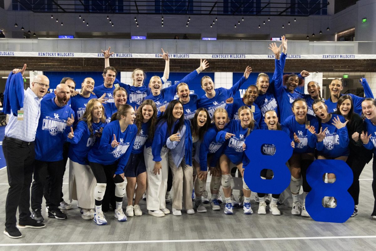 Kentucky Volleyball poses for a photo after becoming eight-time SEC champions during the Volleyball match vs. Arkansas on Sunday, Nov. 24, 2024, at Historic Memorial Coliseum in Lexington, Kentucky. Kentucky won 3-0. Photo by Matthew Mueller | Photo Editor