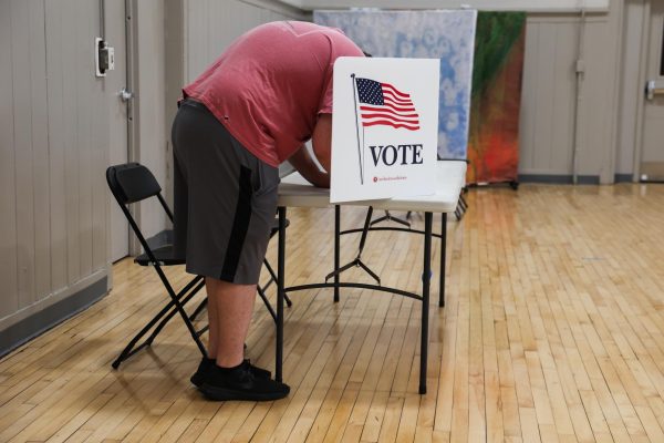 A voter fills out their ballot on Election Day Tuesday, Nov. 5, 2024, at The Carver Center in Lexington, Kentucky. Photo by Abbey Cutrer